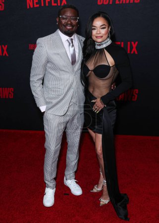 Photo for Lil Rel Howery and girlfriend Dannella Lane arrive at the Los Angeles Premiere Of Netflix's 'The Out-Laws' held at Regal LA Live on June 26, 2023 in Los Angeles, California, United States. - Royalty Free Image