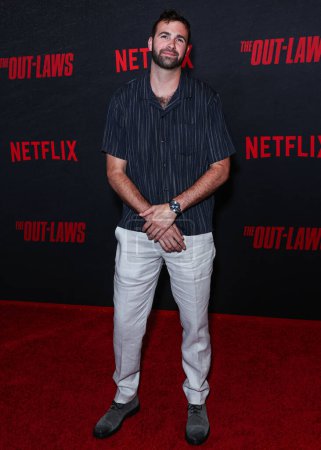 Foto de Ronald Gladden llega al estreno en Los Ángeles de 'The Out-Laws' de Netflix celebrado en Regal LA Live el 26 de junio de 2023 en Los Ángeles, California, Estados Unidos. - Imagen libre de derechos