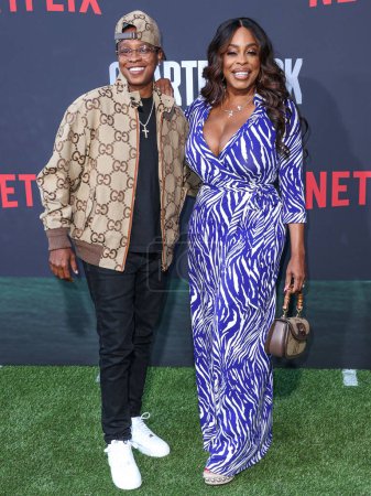 Photo for Jessica Betts and wife Niecy Nash Betts arrive at the Los Angeles Premiere Of Netflix's 'Quarterback' Season 1 held at the Netflix Tudum Theater on July 11, 2023 in Hollywood, Los Angeles, California, United States. - Royalty Free Image