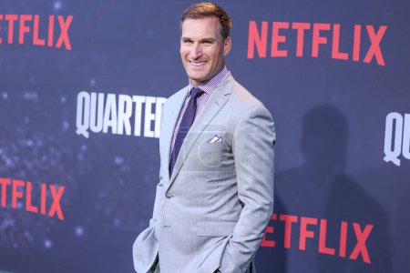 Photo for American football quarterback for the Minnesota Vikings of the National Football League Kirk Cousins arrives at the Los Angeles Premiere Of Netflix's 'Quarterback' Season 1 held at the Netflix Tudum Theater on July 11, 2023 in Hollywood, Los Angeles, - Royalty Free Image