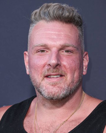 Photo for Former football punter and kickoff specialist Pat McAfee arrives at the Los Angeles Premiere Of Netflix's 'Quarterback' Season 1 held at the Netflix Tudum Theater on July 11, 2023 in Hollywood, Los Angeles - Royalty Free Image