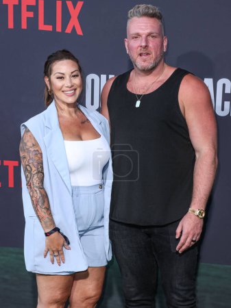 Photo for Samantha McAfee and Pat McAfee arrive at the Los Angeles Premiere Of Netflix's 'Quarterback' Season 1 held at the Netflix Tudum Theater on July 11, 2023 in Hollywood, Los Angeles, California, United States. - Royalty Free Image