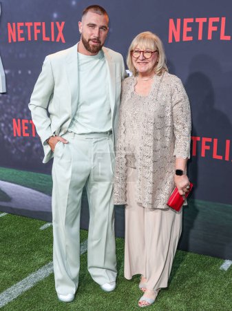 Photo for Travis Kelce and mother Donna Kelce arrive at the Los Angeles Premiere Of Netflix's 'Quarterback' Season 1 held at the Netflix Tudum Theater on July 11, 2023 in Hollywood, Los Angeles - Royalty Free Image