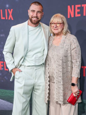 Photo for Travis Kelce and mother Donna Kelce arrive at the Los Angeles Premiere Of Netflix's 'Quarterback' Season 1 held at the Netflix Tudum Theater on July 11, 2023 in Hollywood, Los Angeles - Royalty Free Image