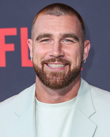 Photo for American football tight end for the Kansas City Chiefs of the National Football League Travis Kelce arrives at the Los Angeles Premiere Of Netflix's 'Quarterback' Season 1 held at the Netflix Tudum Theater on July 11, 2023 in Hollywood, Los Angeles - Royalty Free Image