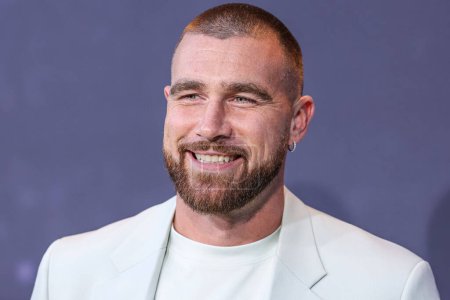 Photo for American football tight end for the Kansas City Chiefs of the National Football League Travis Kelce arrives at the Los Angeles Premiere Of Netflix's 'Quarterback' Season 1 held at the Netflix Tudum Theater on July 11, 2023 in Hollywood, Los Angeles - Royalty Free Image