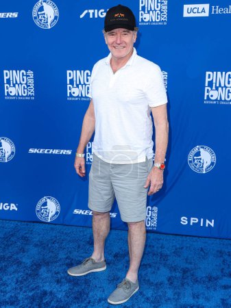 Photo for American actor, producer and director Bryan Cranston arrives at Kershaw's Challenge 10th Annual Ping Pong 4 Purpose 2023 Charity Event Celebrity Tournament held at Dodger Stadium on July 27, 2023 in Elysian Park, Los Angeles, California, USA. - Royalty Free Image