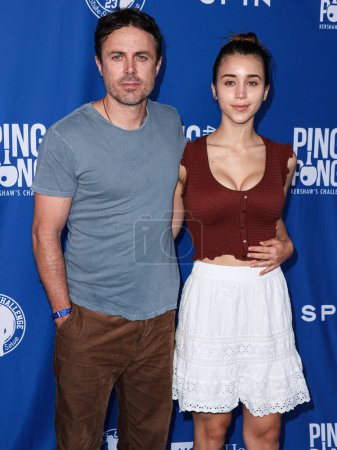 Photo for Casey Affleck and girlfriend Caylee Cowan arrive at Kershaw's Challenge 10th Annual Ping Pong 4 Purpose 2023 Charity Event Celebrity Tournament held at Dodger Stadium on July 27, 2023 in Elysian Park, Los Angeles, California, United States. - Royalty Free Image
