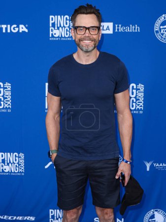 Photo for American actor, comedian and television host Joel McHale arrives at Kershaw's Challenge 10th Annual Ping Pong 4 Purpose 2023 Charity Event Celebrity Tournament held at Dodger Stadium on July 27, 2023 in Elysian Park, Los Angeles, California, USA - Royalty Free Image