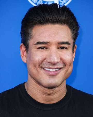 Photo for American actor and television host Mario Lopez arrives at Kershaw's Challenge 10th Annual Ping Pong 4 Purpose 2023 Charity Event Celebrity Tournament held at Dodger Stadium on July 27, 2023 in Elysian Park, Los Angeles, California, United States. - Royalty Free Image