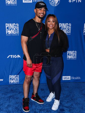 Photo for Mookie Betts and wife Brianna Betts arrive at Kershaw's Challenge 10th Annual Ping Pong 4 Purpose 2023 Charity Event Celebrity Tournament held at Dodger Stadium on July 27, 2023 in Elysian Park, Los Angeles, California, United States. - Royalty Free Image