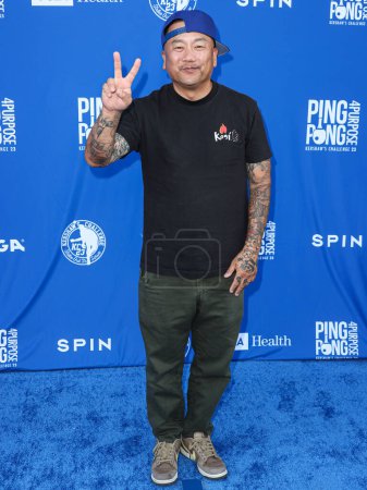 Photo for Korean-American chef Roy Choi arrives at Kershaw's Challenge 10th Annual Ping Pong 4 Purpose 2023 Charity Event Celebrity Tournament held at Dodger Stadium on July 27, 2023 in Elysian Park, Los Angeles, California, United States. - Royalty Free Image
