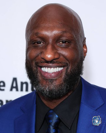 Photo for American former professional basketball player Lamar Odom arrives at the 23rd Annual Harold And Carole Pump Foundation Gala held at The Beverly Hilton Hotel on August 18, 2023 in Beverly Hills, Los Angeles, California, United States - Royalty Free Image