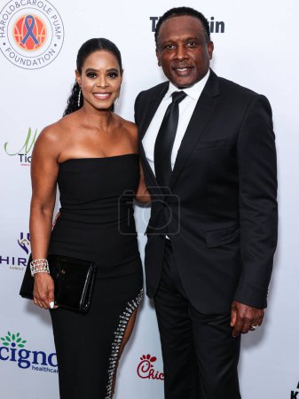Photo for Sherice Weaver and Tim Brown arrive at the 23rd Annual Harold And Carole Pump Foundation Gala held at The Beverly Hilton Hotel on August 18, 2023 in Beverly Hills, Los Angeles, California, United States. - Royalty Free Image