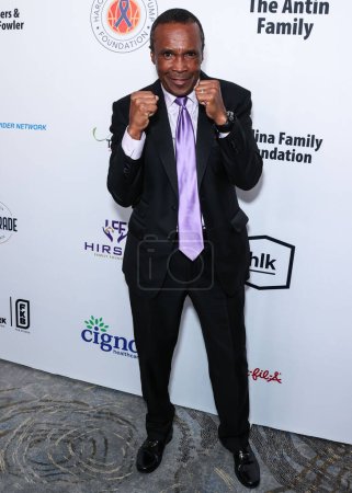 Photo for American former professional boxer Sugar Ray Leonard arrives at the 23rd Annual Harold And Carole Pump Foundation Gala held at The Beverly Hilton Hotel on August 18, 2023 in Beverly Hills, Los Angeles, California, United States - Royalty Free Image