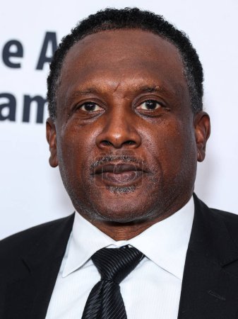 Photo for American former professional football wide receiver Tim Brown arrives at the 23rd Annual Harold And Carole Pump Foundation Gala held at The Beverly Hilton Hotel on August 18, 2023 in Beverly Hills, Los Angeles, California, United States - Royalty Free Image