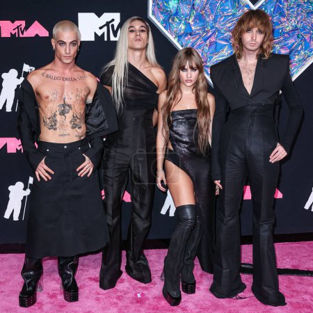 Photo for Damiano David, Ethan Torchio, Victoria De Angelis and Thomas Raggi of Mneskin (Maneskin) wearing outfits by Rick Owens arrive at the 2023 MTV Video Music Awards held at the Prudential Center on September 12, 2023 in Newark, New Jersey, USA - Royalty Free Image