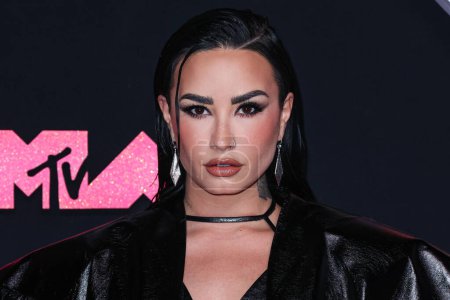 Photo for Demi Lovato wearing Christian Louboutin pumps arrives at the 2023 MTV Video Music Awards held at the Prudential Center on September 12, 2023 in Newark, New Jersey, United States. - Royalty Free Image