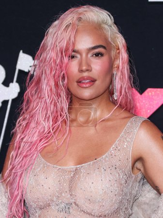 Photo for Karol G wearing Jacob and Co. jewelry arrives at the 2023 MTV Video Music Awards held at the Prudential Center on September 12, 2023 in Newark, New Jersey, United States. - Royalty Free Image