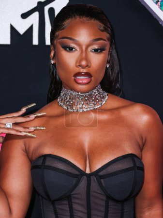Photo for Megan Thee Stallion wearing a Brandon Blackwood dress and Jacob and Co. jewelry arrives at the 2023 MTV Video Music Awards held at the Prudential Center on September 12, 2023 in Newark, New Jersey, United States. - Royalty Free Image