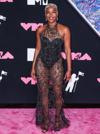 Photo for Tiffany Haddish wearing a Jason Wu dress, Giuseppe Zanotti shoes, and REZA jewelry arrives at the 2023 MTV Video Music Awards held at the Prudential Center on September 12, 2023 in Newark, New Jersey, United States. - Royalty Free Image