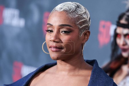 Photo for American comedian and actress Tiffany Haddish arrives at Knott's Scary Farm 50th Anniversary Celebrity Black Carpet held at Knott's Berry Farm on September 23, 2023 in Buena Park, Orange County, California, United States. - Royalty Free Image