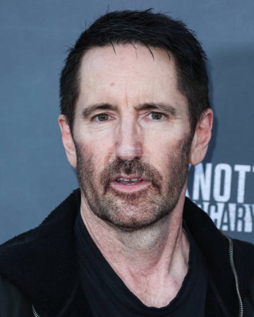 Photo for Trent Reznor, Nine Inch Nails of American industrial rock band Nine Inch Nails arrives at Knott's Scary Farm 50th Anniversary Celebrity Black Carpet held at Knott's Berry Farm on September 23, 2023 in Buena Park, Orange County, California, USA - Royalty Free Image