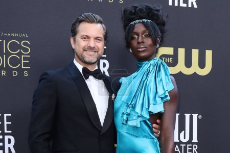 Photo for Joshua Jackson and Jodie Turner-Smith arrive at the 27th Annual Critics' Choice Awards held at the Fairmont Century Plaza Hotel on March 13, 2022 in Century City, Los Angeles, California, United States - Royalty Free Image