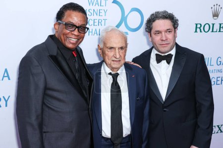 Photo for Herbie Hancock, Frank Gehry and Gustavo Dudamel arrive at The Los Angeles Philharmonic's 20th Anniversary Gala Honoring Frank Gehry held at the Walt Disney Concert Hall on October 5, 2023 in Los Angeles, California, United States. - Royalty Free Image