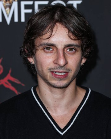 Photo for American actor Moises Arias arrives at the 23rd Annual Screamfest Horror Film Festival - Opening Night - Los Angeles Premiere Of Sumerian Films 'Divinity' held at the TCL Chinese Theatre IMAX on October 10, 2023 in Hollywood, Los Angeles, California - Royalty Free Image