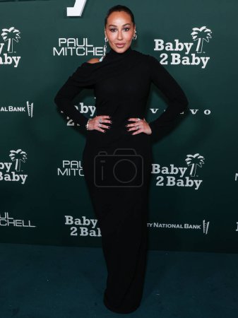 Photo for Adrienne Bailon-Houghton wearing Alberta Ferretti arrives at the 2023 Baby2Baby Gala Presented By Paul Mitchell held at the Pacific Design Center on November 11, 2023 in West Hollywood, Los Angeles, California, United States. - Royalty Free Image