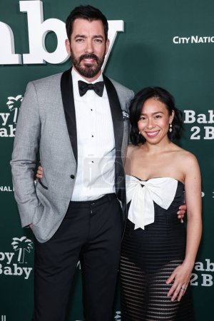 Photo for Drew Scott and Linda Phan arrive at the 2023 Baby2Baby Gala Presented By Paul Mitchell held at the Pacific Design Center on November 11, 2023 in West Hollywood, Los Angeles, California, United States. - Royalty Free Image