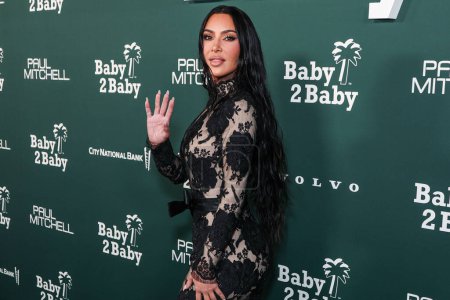 Photo for Kim Kardashian wearing Balenciaga FW23 RTW arrives at the 2023 Baby2Baby Gala Presented By Paul Mitchell held at the Pacific Design Center on November 11, 2023 in West Hollywood, Los Angeles, California, United States. - Royalty Free Image