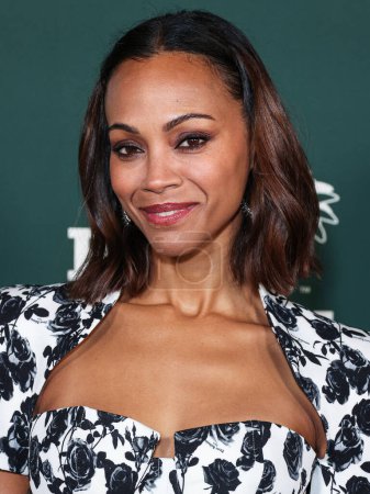 Photo for Zoe Saldana wearing Balmain and Reza jewelry arrives at the 2023 Baby2Baby Gala Presented By Paul Mitchell held at the Pacific Design Center on November 11, 2023 in West Hollywood, Los Angeles, California, United States. - Royalty Free Image