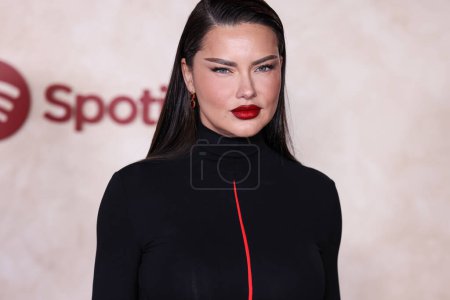 Photo for Brazilian model Adriana Lima arrives at the Los Angeles Premiere Of Lions Gate Films' 'The Hunger Games: The Ballad Of Songbirds And Snakes' held at the TCL Chinese Theatre IMAX on November 13, 2023 in Hollywood, Los Angeles, California - Royalty Free Image