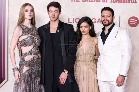 Photo for Hunter Schafer, Tom Blyth, Rachel Zegler and Josh Andres Rivera arrive at the Los Angeles Premiere Of Lions Gate Films' 'The Hunger Games: The Ballad Of Songbirds And Snakes' held at the TCL Chinese Theatre IMAX on November 13, 2023 in Hollywood, LA - Royalty Free Image