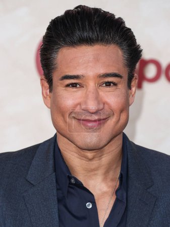 Photo for American actor and television host Mario Lopez arrives at the Los Angeles Premiere Of Lions Gate Films' 'The Hunger Games: The Ballad Of Songbirds And Snakes' held at the TCL Chinese Theatre IMAX on November 13, 2023 in Hollywood, Los Angeles - Royalty Free Image