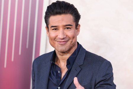 Photo for American actor and television host Mario Lopez arrives at the Los Angeles Premiere Of Lions Gate Films' 'The Hunger Games: The Ballad Of Songbirds And Snakes' held at the TCL Chinese Theatre IMAX on November 13, 2023 in Hollywood, Los Angeles - Royalty Free Image