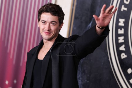 Photo for English actor Tom Blyth arrives at the Los Angeles Premiere Of Lions Gate Films' 'The Hunger Games: The Ballad Of Songbirds And Snakes' held at the TCL Chinese Theatre IMAX on November 13, 2023 in Hollywood, Los Angeles, California, United States. - Royalty Free Image