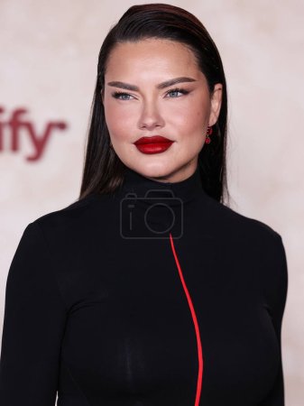 Photo for Brazilian model Adriana Lima arrives at the Los Angeles Premiere Of Lions Gate Films' 'The Hunger Games: The Ballad Of Songbirds And Snakes' held at the TCL Chinese Theatre IMAX on November 13, 2023 in Hollywood, Los Angeles, California - Royalty Free Image