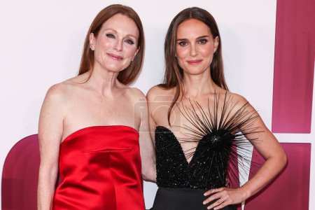 Photo for Julianne Moore and Natalie Portman arrive at the Los Angeles Premiere Of Netflix's 'May December' held at the Academy Museum of Motion Pictures on November 16, 2023 in Los Angeles, California, United States. - Royalty Free Image