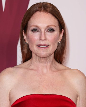 Photo for American actress Julianne Moore wearing a Prada dress arrives at the Los Angeles Premiere Of Netflix's 'May December' held at the Academy Museum of Motion Pictures on November 16, 2023 in Los Angeles, California, United States. - Royalty Free Image