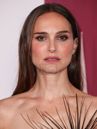 Photo for Israeli-American actress Natalie Portman wearing a Schiaparelli dress arrives at the Los Angeles Premiere Of Netflix's 'May December' held at the Academy Museum of Motion Pictures on November 16, 2023 in Los Angeles, California, United States. - Royalty Free Image