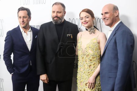 Photo for David Greenbaum, Yorgos Lanthimos, Emma Stone and Matthew Greenfield arrive at the New York Premiere Of Searchlight Pictures' 'Poor Things' held at the DGA New York Theater on December 6, 2023 in Manhattan, New York City, New York, United States. - Royalty Free Image