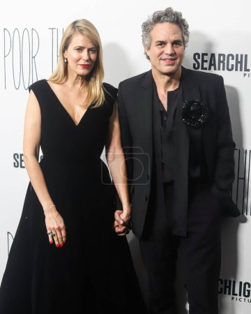 Photo for Sunrise Coigney and husband/American actor Mark Ruffalo arrive at the New York Premiere Of Searchlight Pictures' 'Poor Things' held at the DGA New York Theater on December 6, 2023 in Manhattan, New York City, New York, United States. - Royalty Free Image