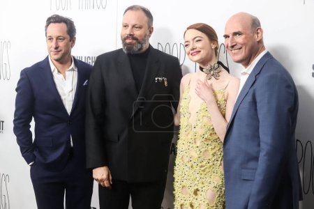 Photo for David Greenbaum, Yorgos Lanthimos, Emma Stone and Matthew Greenfield arrive at the New York Premiere Of Searchlight Pictures' 'Poor Things' held at the DGA New York Theater on December 6, 2023 in Manhattan, New York City, New York, United States. - Royalty Free Image