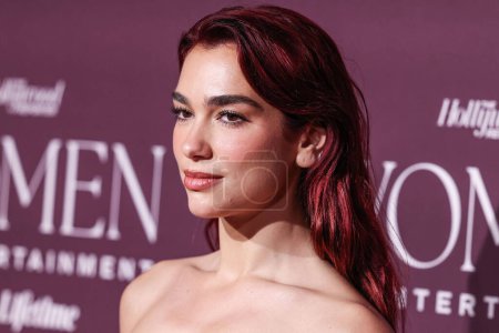 Photo for English-Albanian singer and songwriter Dua Lipa arrives at The Hollywood Reporter's Women In Entertainment Gala 2023 presented by Lifetime held at The Beverly Hills Hotel on December 7, 2023 in Beverly Hills, Los Angeles, California, United States. - Royalty Free Image