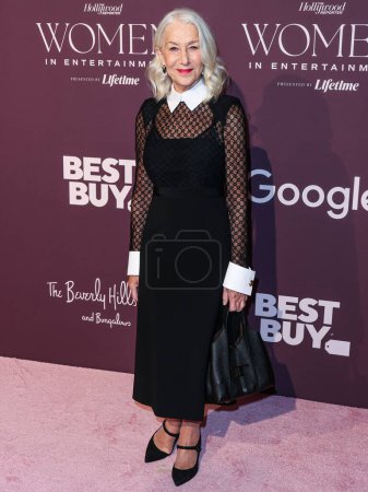 Photo for British actress Helen Mirren wearing Gucci arrives at The Hollywood Reporter's Women In Entertainment Gala 2023 presented by Lifetime held at The Beverly Hills Hotel on December 7, 2023 in Beverly Hills, Los Angeles, California, United States. - Royalty Free Image