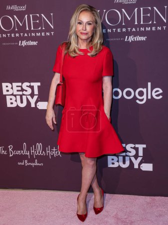 Photo for American socialite, fashion designer, actress and television personality Kathy Hilton wearing Valentino arrives at The Hollywood Reporter's Women In Entertainment Gala 2023 presented by Lifetime held at The Beverly Hills Hotel on December 7, 2023 - Royalty Free Image