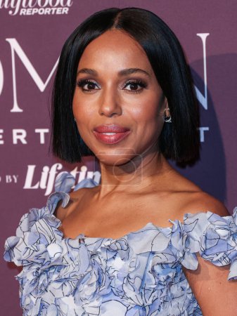 Photo for American actress Kerry Washington (clutch and jewelry detail) arrives at The Hollywood Reporter's Women In Entertainment Gala 2023 presented by Lifetime held at The Beverly Hills Hotel on December 7, 2023 in Beverly Hills, Los Angeles, USA - Royalty Free Image